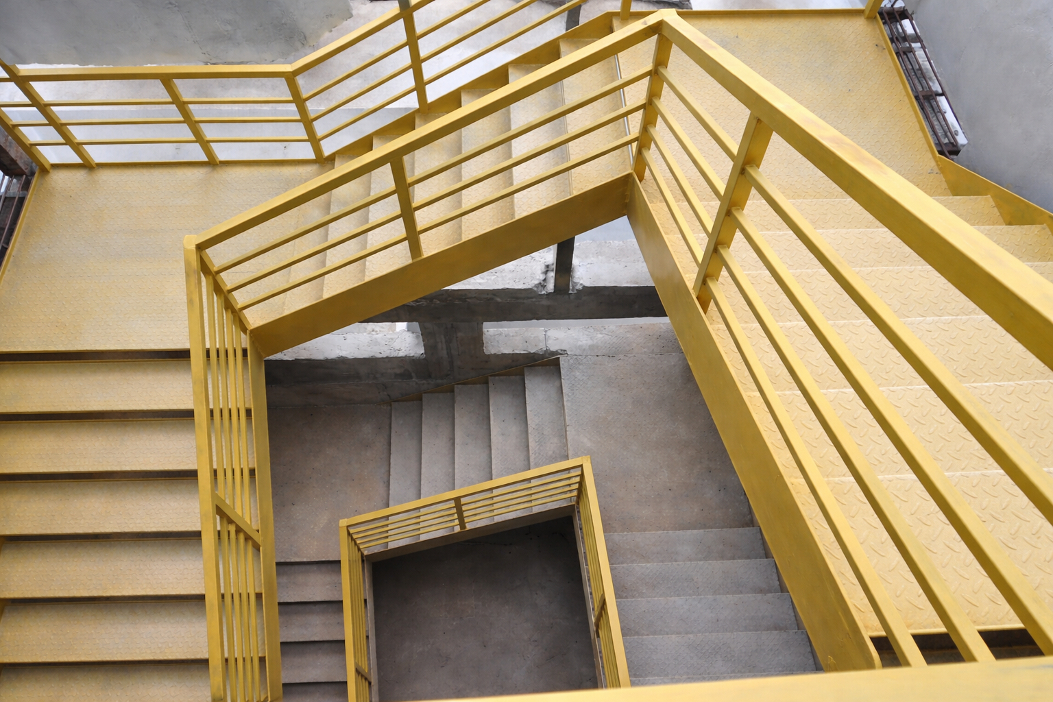 High-load industrial steel staircase under fabrication